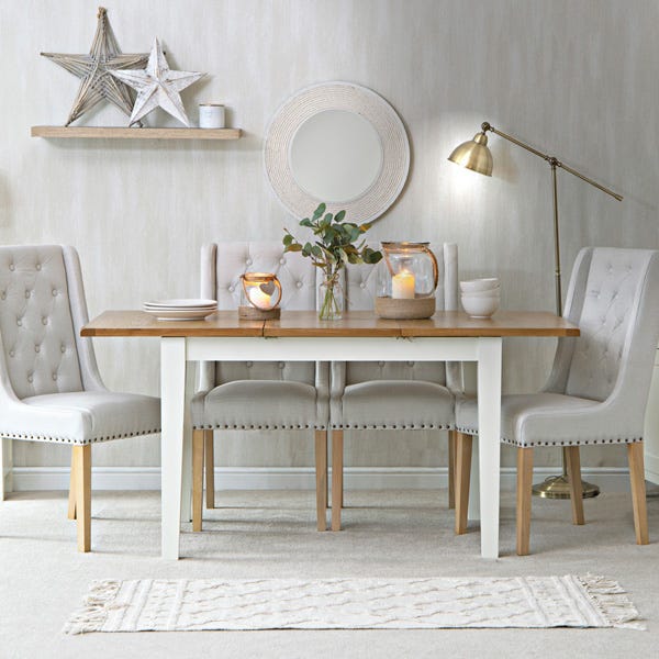 Stylish Dining Tables for Every Space and Occasion showcase a beautiful oak table with elegant chairs in a cozy setting.