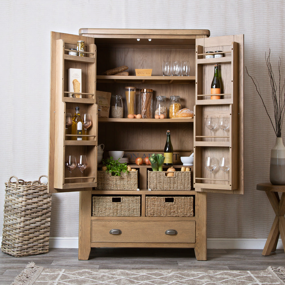 Wessex Smoked Oak Collection for Elegant Home Decor showcases stylish storage with bold oak frames and a smoked finish.