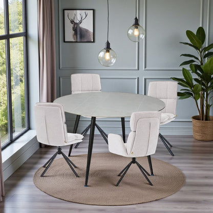 1.2m Grey Circular Ceramic Table &amp; 4 x Grey Luxe Panel Stitch Swivel Chair Set - The Furniture Warehouse