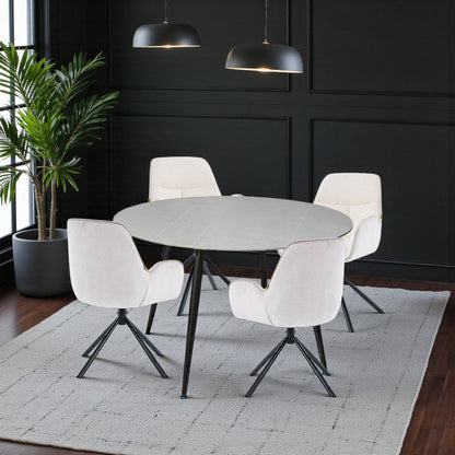 1.2m Grey Circular Ceramic Table &amp; 4 x Grey Luxe T Stitch Swivel Chair Set - The Furniture Warehouse