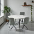 1.2m White Circular Ceramic Table & 4 x Forest Green Luxe Panel Stitch Swivel Chair Set - The Furniture Warehouse